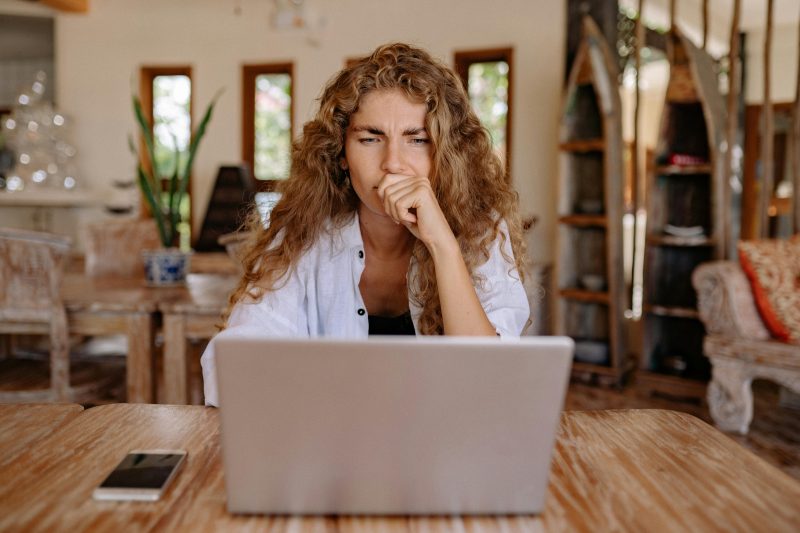 New immigrant reviewing financial documents and learning how pay slips work in Australia