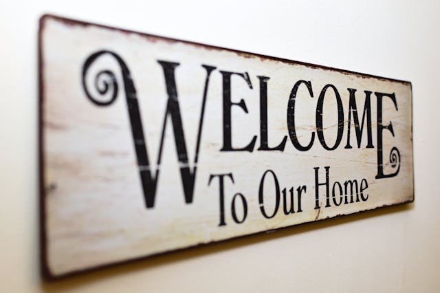 Front door of a new home in Australia bought by immigrants without a credit card