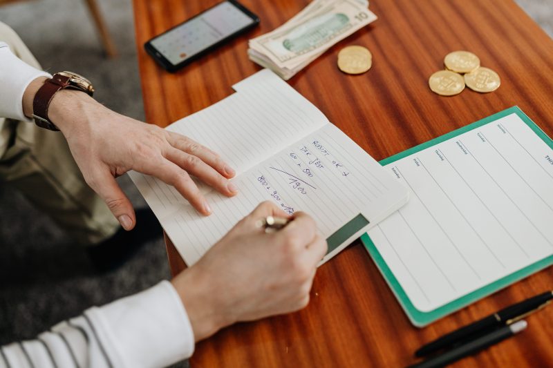 Notebook and savings plan for the upfront costs of renting in Australia