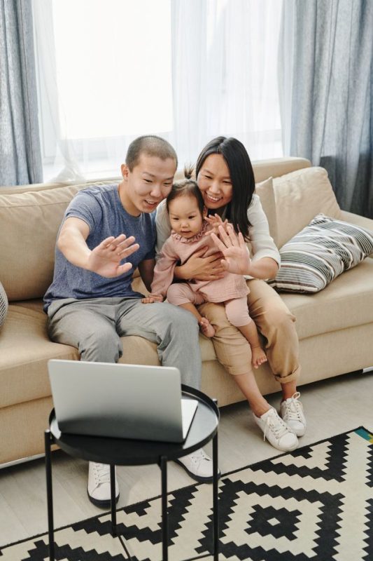 Family video calling loved ones overseas from Australia