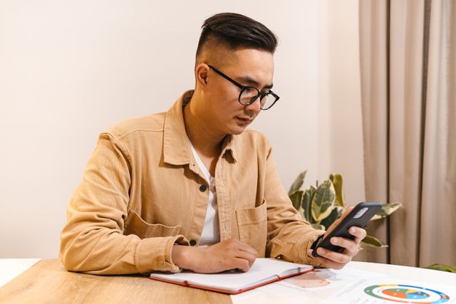 Person comparing money transfer rates on a phone in Australia
