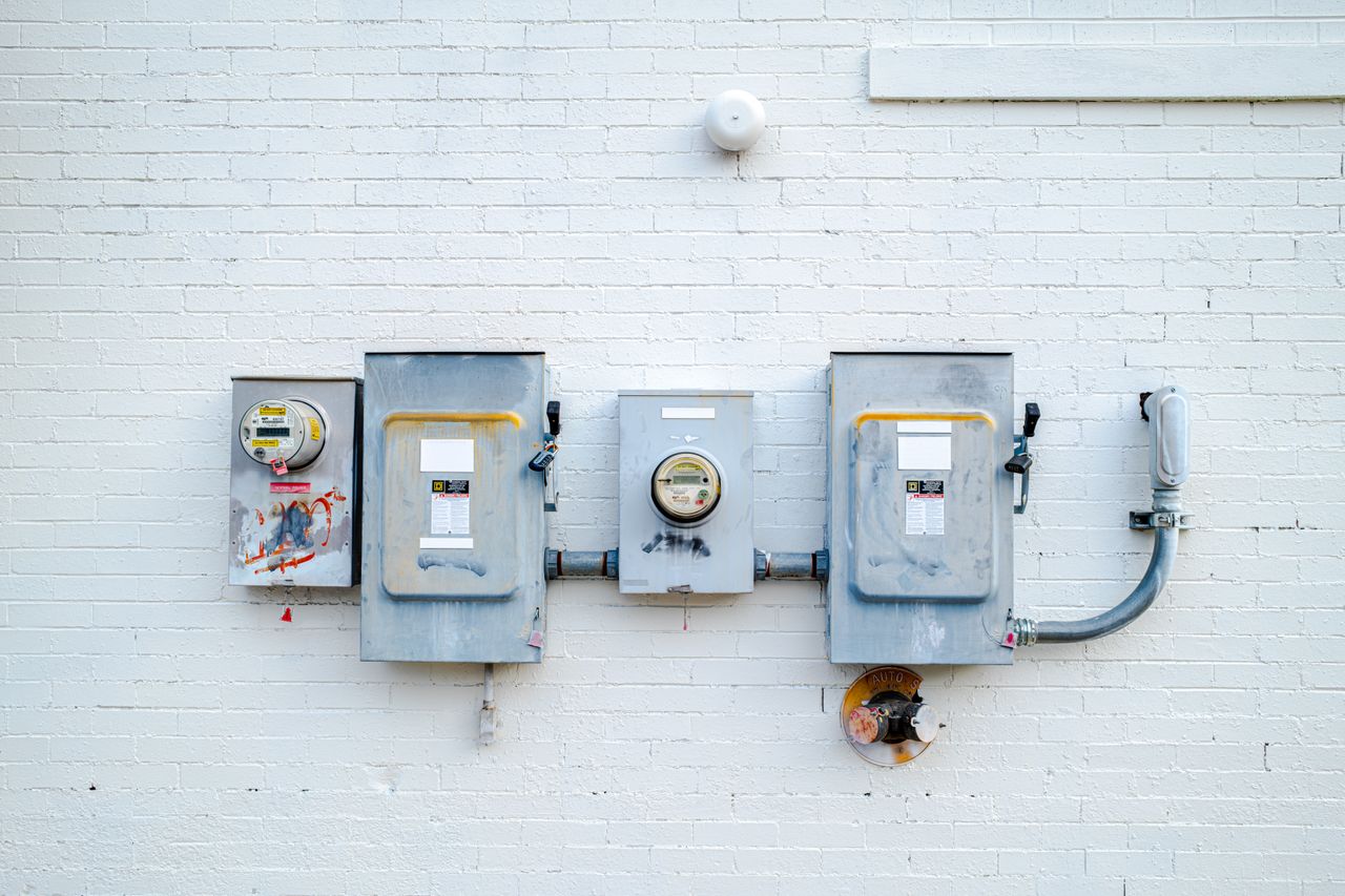 Electricity meter on the outside wall of a house